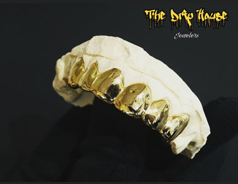 6 solid gold teeth
