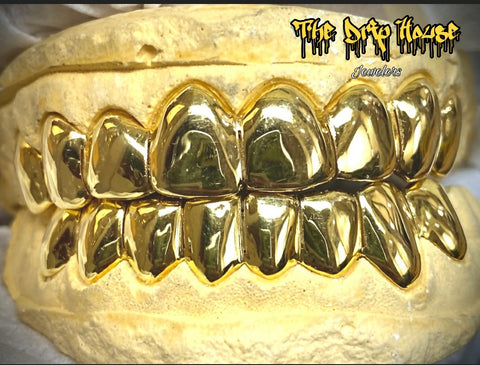 8 top and bottom solid gold Grillz